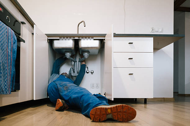Professional Drain Cleaning technician working in Winfield, KS